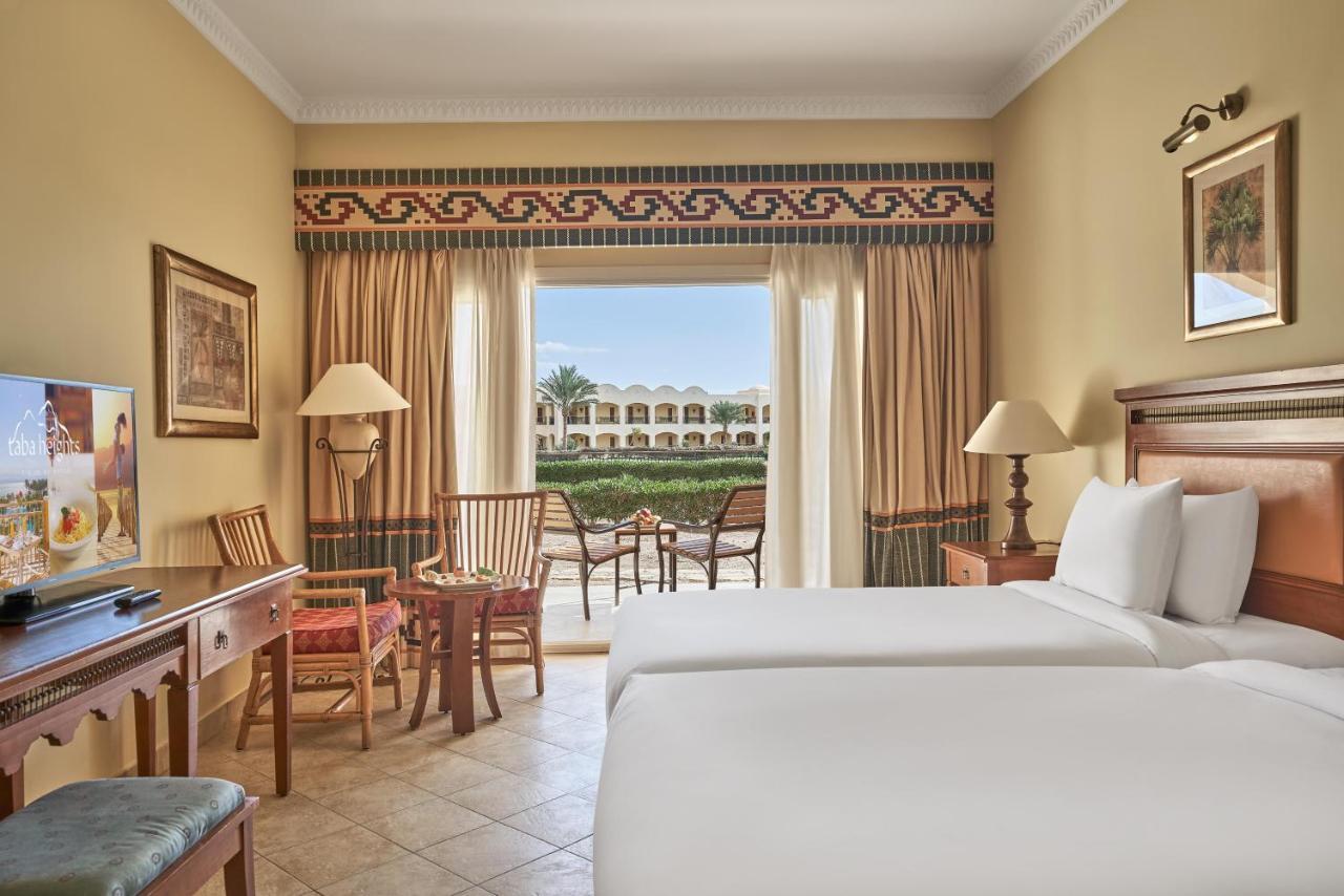 Mosaique Beach Resort Taba Heights Exteriör bild A guest room at Hilton Sharm El-Sheikh Resort